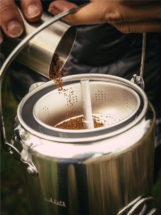 Easy Camp Adventure Coffee Pot - Kettle and Percolator lifestyle image with coffee being poured in 