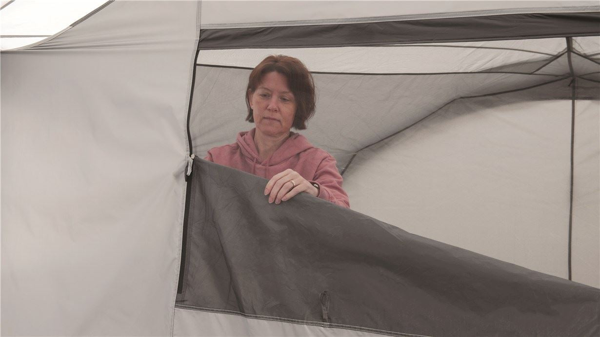 Easy Camp Shelter - 6 Berth Gazebo Shelter Tent lifestyle image of inner tent mesh window being zipped