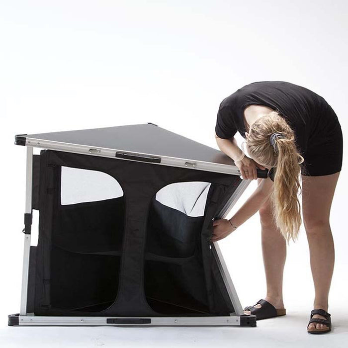 Isabella Folding Corner Cupboard showing leg folding away