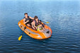 Kondor 2000 Inflatable Dinghy, Oars & Pump Package lifestyle image in water