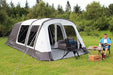 Outdoor Revolution Airedale 5.0S - Inflatable Tunnel Tent front view showing open front door with example furniture
