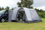 Outdoor Revolution Cayman Curl Mid Driveaway Awning shown attached to van