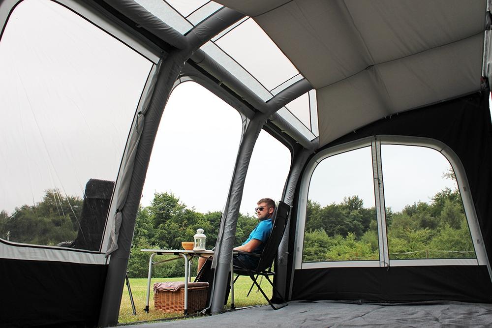 Outdoor Revolution Eclipse Pro 420 interior view showing air frame and example carpet with example roof lining