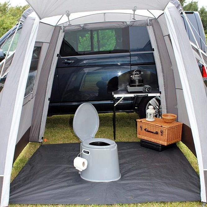 Outdoor Revolution Outhouse Handi LOW Driveaway Awning interior shown with example camping items