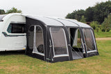Outdoor Revolution Sportlite Air 400 pitched to caravan showing middle window removed for use as doorway and example carpet inside