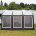 Outdoor Revolution Sportlite Air 400 front view showing 3 windows and pitched to caravan