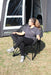 Outdoor Revolution Tubbi XL Chair Grey and Black lifestyle image of women in chair outside awning