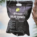Outwell Solar Shower - Camping Shower 20 Litre hanging from tree