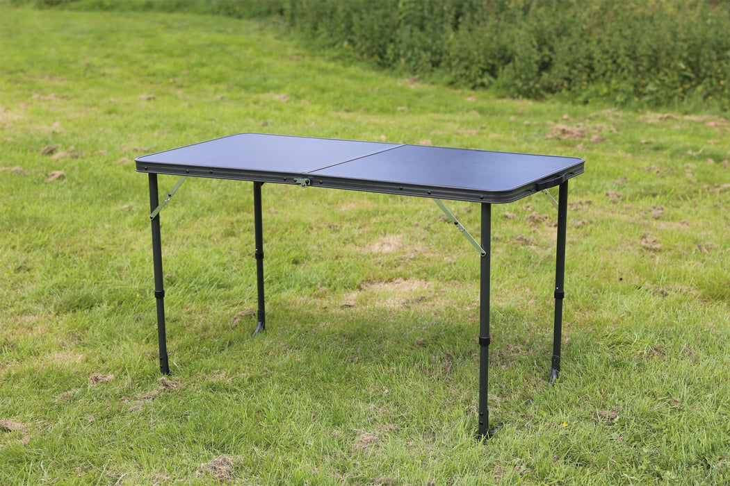 Quest Superlite Stow Folding Table - Black shown in field