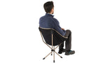 Robens Searcher Lightweight Backpacking Chair open and with someone sitting in the seat