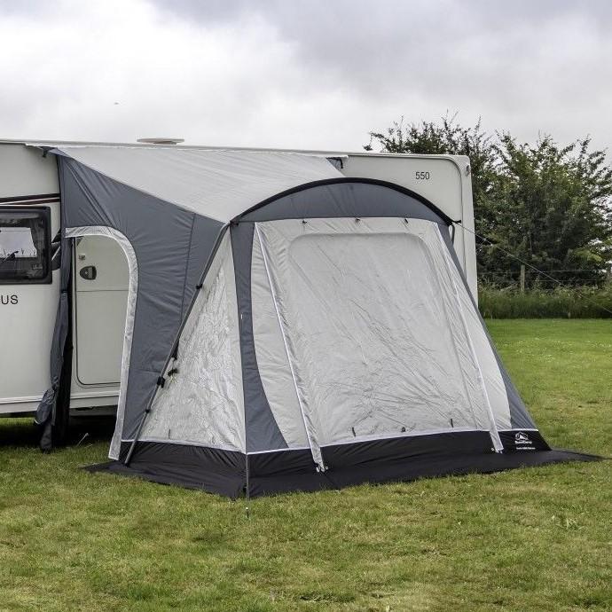 Sunncamp Swift 220 SC - Caravan Porch Awning showing pitched on campsite with guylines and side door open