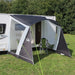 Sunncamp Swift 260 Caravan Canopy - attached to van with example chairs inside canopy - also shows expansive side windows