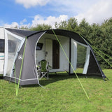 Sunncamp Swift 390 Caravan Canopy with example chairs outside on campsite