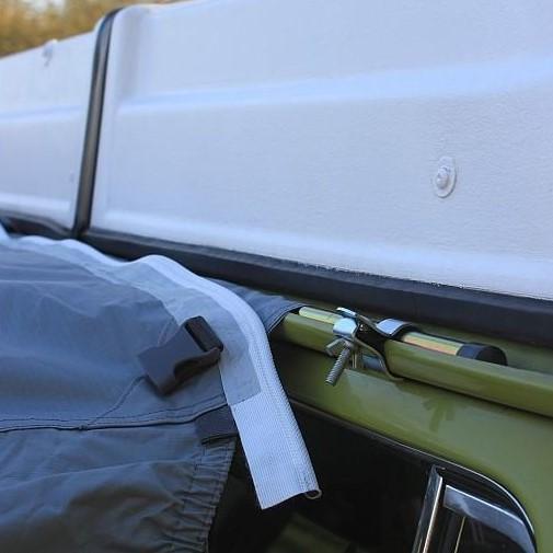 Vango Pole & Clamp Drive Away Attachment Kit shown in use on a van gutter