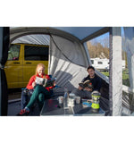 Vango Tolga VW Shadow Grey Inflatable Air Drive Away Awning - Interior view with two people and example chairs and table