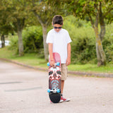 Xootz Doublekick 31 Inch Skateboard - Skull - In Use